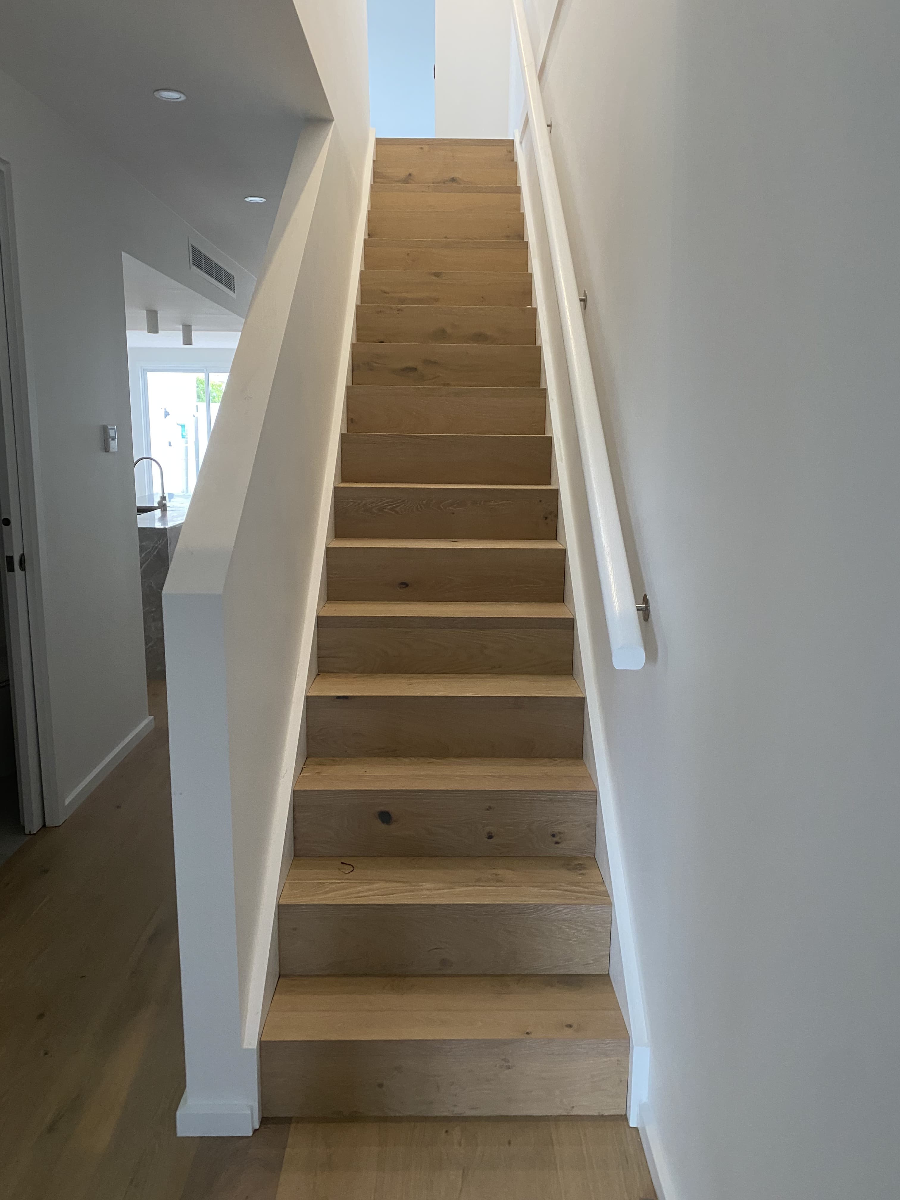 Natural European oak hybrid flooring staircase Melbourne new build
