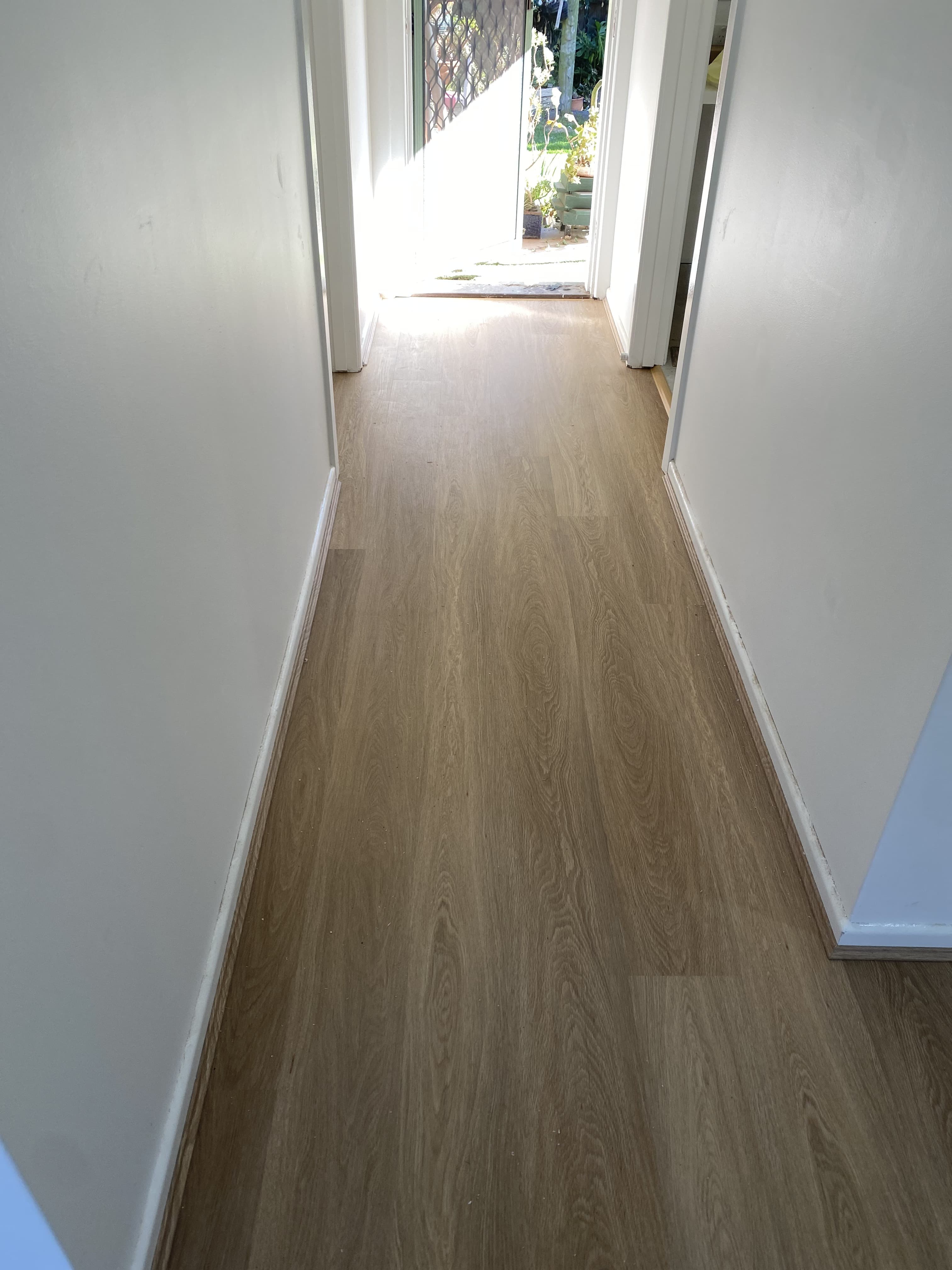 Warm natural oak hybrid flooring hallway Melbourne home