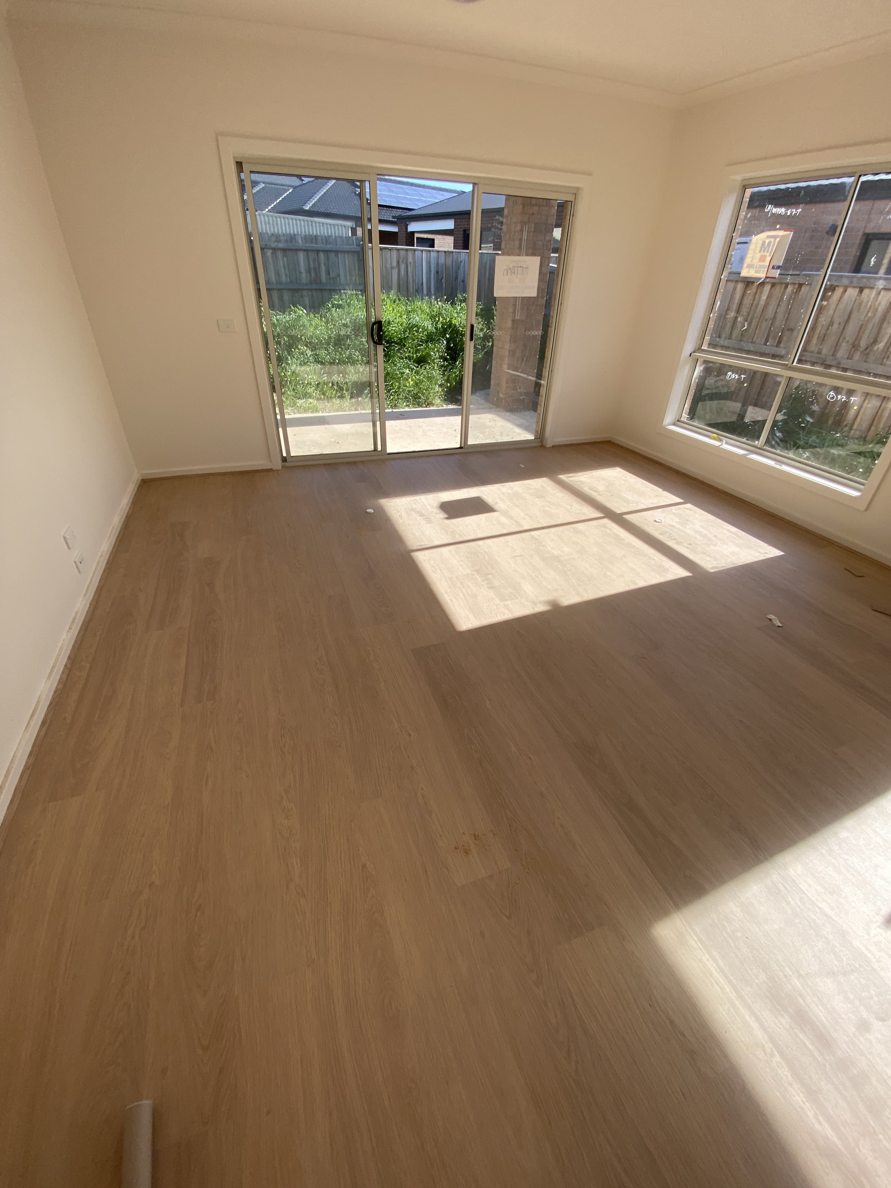Natural oak hybrid flooring new build living room Melbourne