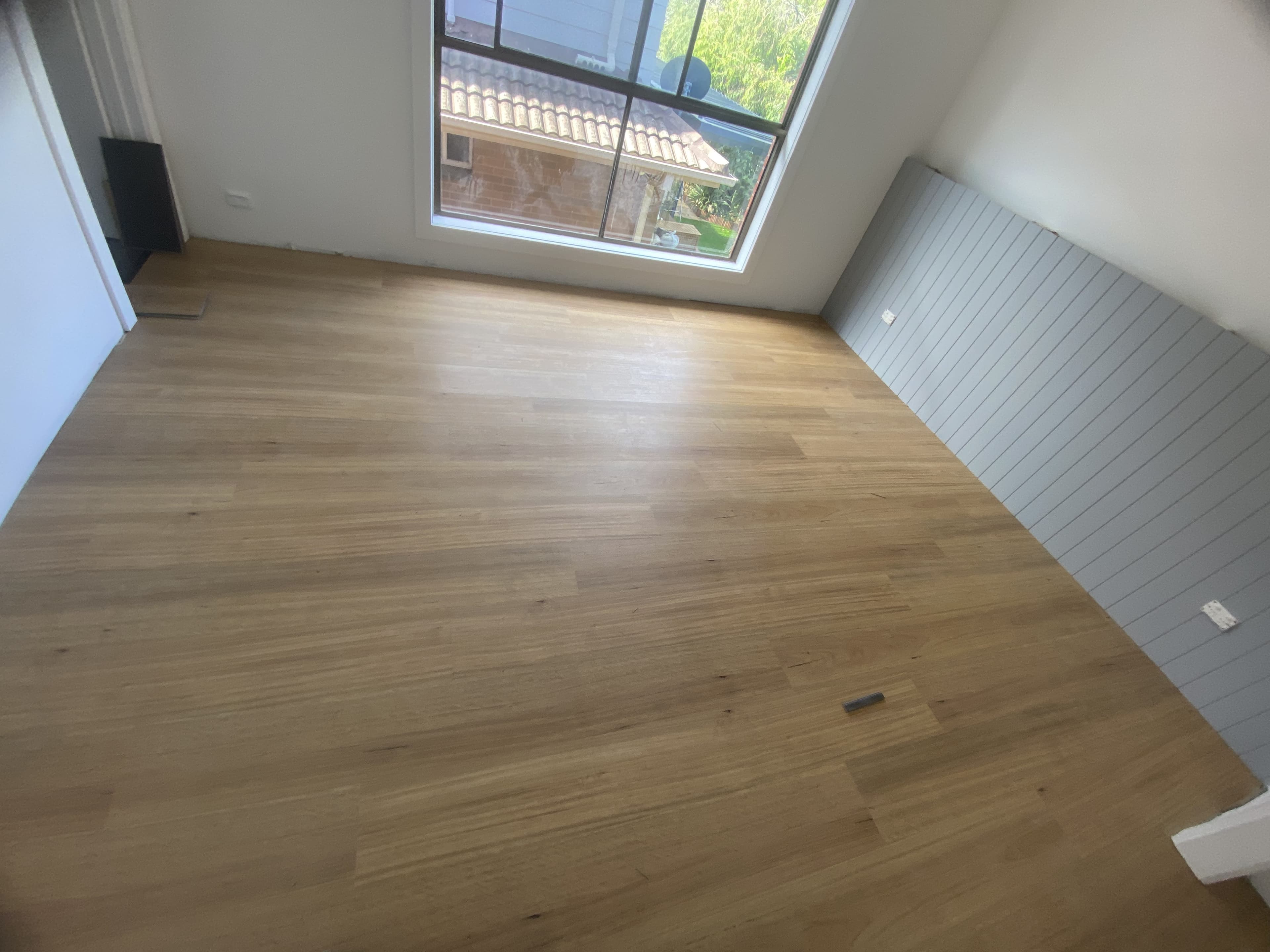 Warm oak hybrid plank living room Footscray